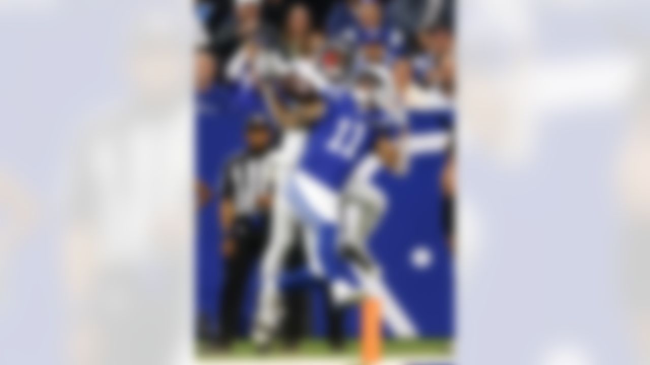 Indianapolis Colts wide receiver Michael Pittman (11) catches a touchdown pass during an NFL football game against the Tennessee Titans on Sunday, October 26, 2025 in Indianapolis, Indiana.