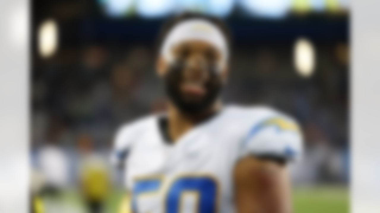 Los Angeles Chargers linebacker Caleb Murphy (50) looks on during an NFL football game against the Detroit Lions on Thursday, July 31, 2025 in Canton, Ohio.