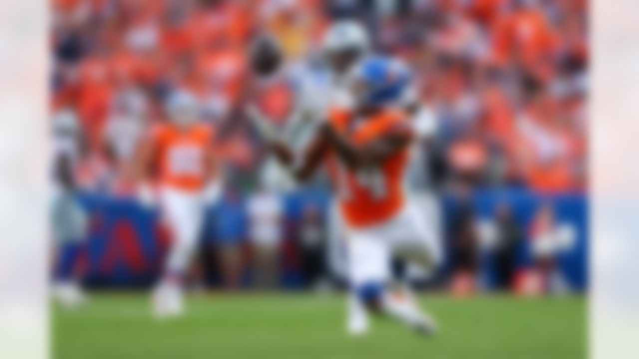 Denver Broncos wide receiver Courtland Sutton (14) attempts to make a catch during an NFL football game against the Dallas Cowboys on Sunday, October 26, 2025 in Denver, Colorado.