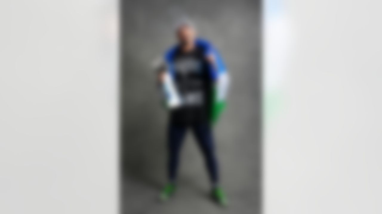 Seattle Seahawks wide receiver Jaxon Smith-Njigba (11) poses for a portrait with the Vince Lombardi Trophy after the NFL Super Bowl LX football game against the New England Patriots on Sunday, February 8, 2026 in Santa Clara, Calif.