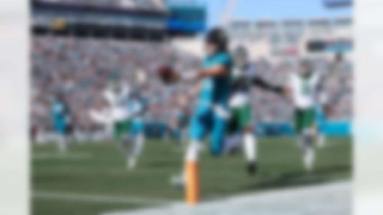 Jacksonville Jaguars quarterback Trevor Lawrence (16) scores a touchdown during an NFL football game against the New York Jets on Sunday, Dec. 14, 2025 in Jacksonville, Florida.