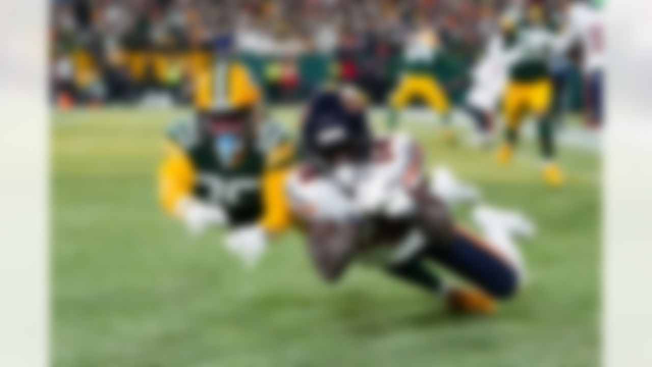 Chicago Bears wide receiver Olamide Zaccheaus (14) catches the ball in the end zone during an NFL football game against the Green Bay Packers on Sunday, December 7, 2025 in Green Bay, Wisconsin.