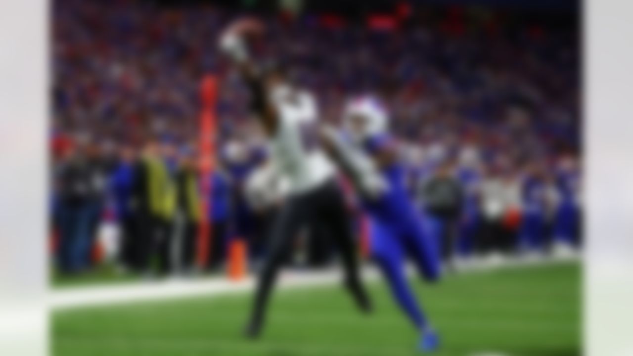 Baltimore Ravens wide receiver DeAndre Hopkins (10) grabs a pass for a touchdown in front of Buffalo Bills linebacker Keonta Jenkins (49) during the second half of an NFL football game in Orchard Park, N.Y., Sunday, Sept. 7, 2025.