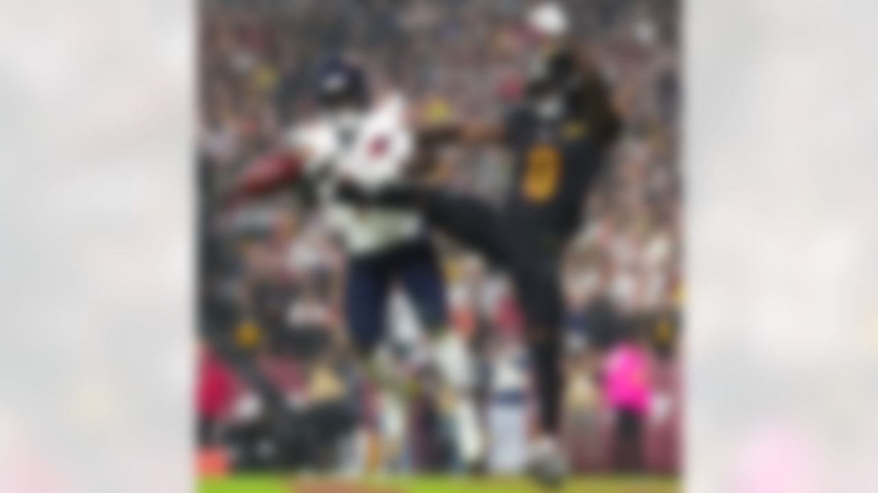 Washington Commanders cornerback Mike Sainristil (0) breaks up a pass during an NFL football game against the Chicago Bears on Monday, Oct. 13, 2025 in Landover, Maryland.