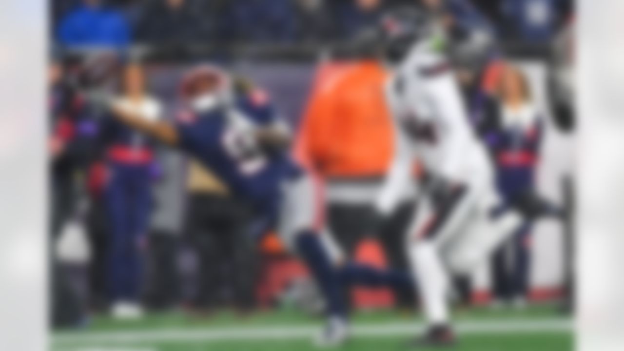New England Patriots wide receiver Kayshon Boutte (9) catches a touchdown pass against Houston Texans cornerback Derek Stingley Jr. during the second half of an NFL divisional playoff football game, Sunday, Jan. 18, 2026, in Foxborough, Mass.
