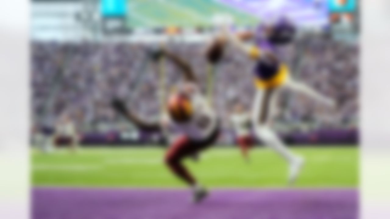 Minnesota Vikings wide receiver Justin Jefferson (18) is unable to catch a pass while defended by Washington Commanders cornerback Mike Sainristil (0) in the end zone during the second half of an NFL football game, Sunday, Dec. 7, 2025, in Minneapolis.