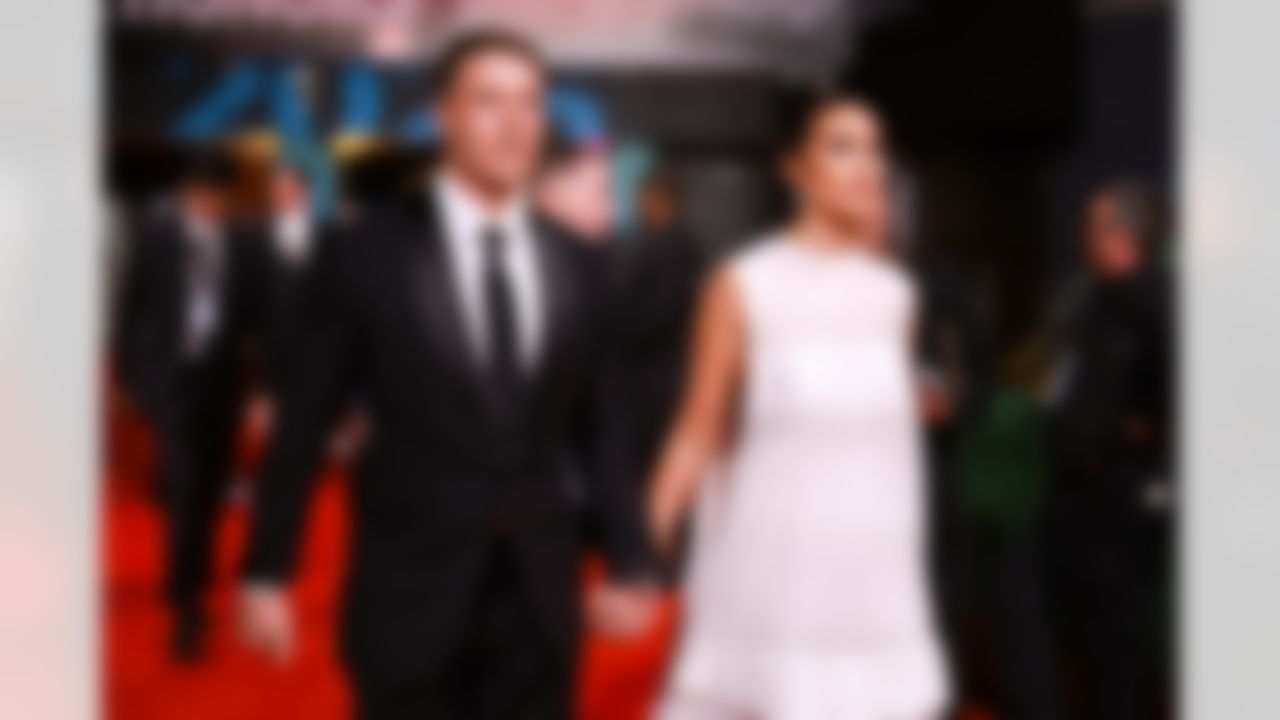 San Francisco 49ers running back Christian McCaffrey (23) and model Olivia Culpo walk on the red carpet prior to the NFL Honors awards show on Thursday, February 5, 2026 in San Francisco, California.