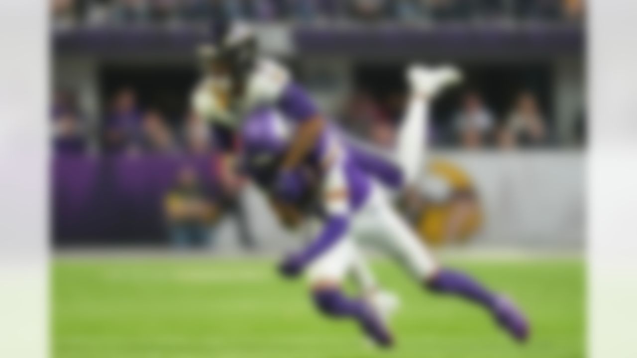 Minnesota Vikings wide receiver Justin Jefferson is tackled by Baltimore Ravens cornerback Nate Wiggins (2) on a first down reception in the first half of an NFL football game, Sunday, Nov. 9, 2025, in Minneapolis.