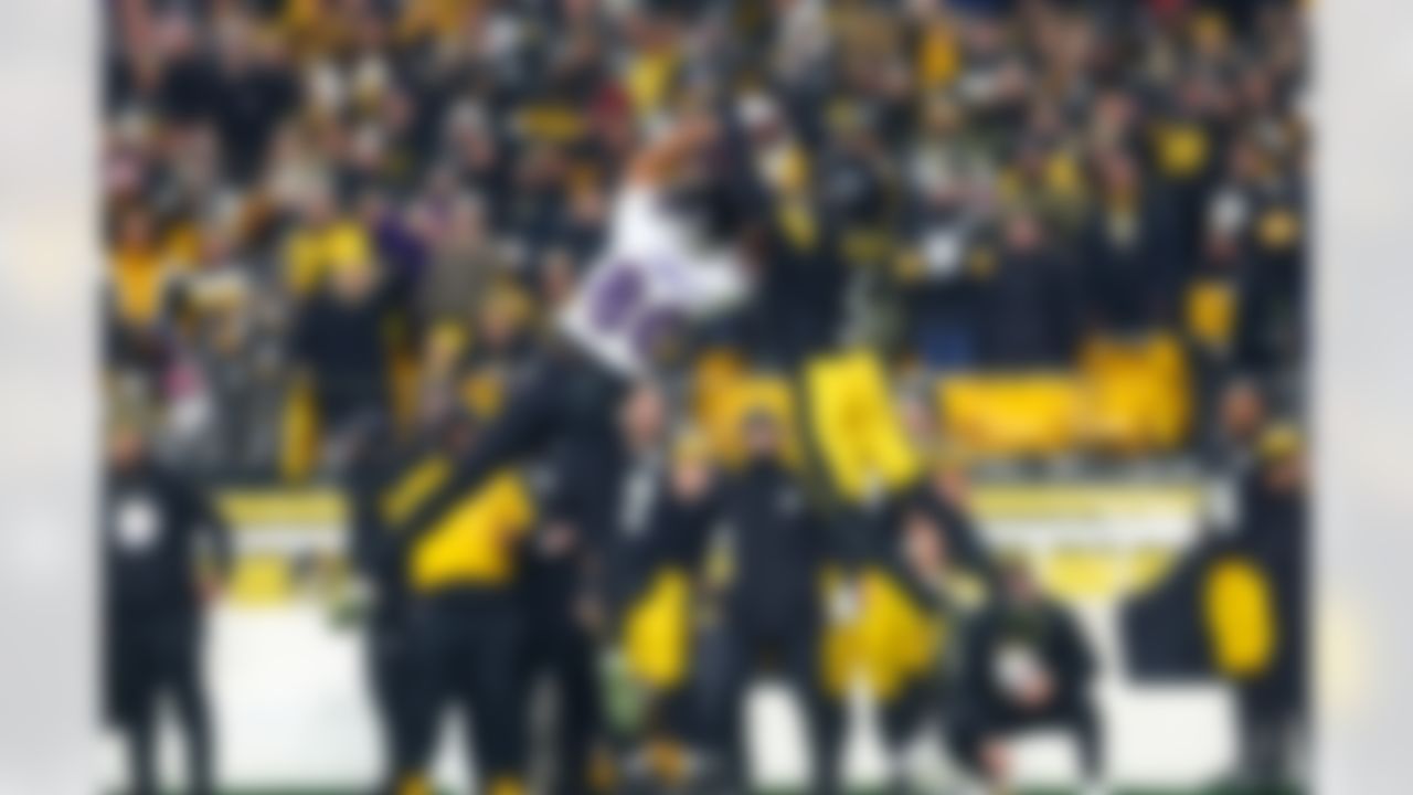 Baltimore Ravens tight end Isaiah Likely (80) makes a catch under pressure by Pittsburgh Steelers cornerback Jalen Ramsey (5) during an NFL football game on Sunday, January 4, 2026 in Pittsburgh, Pennsylvania.