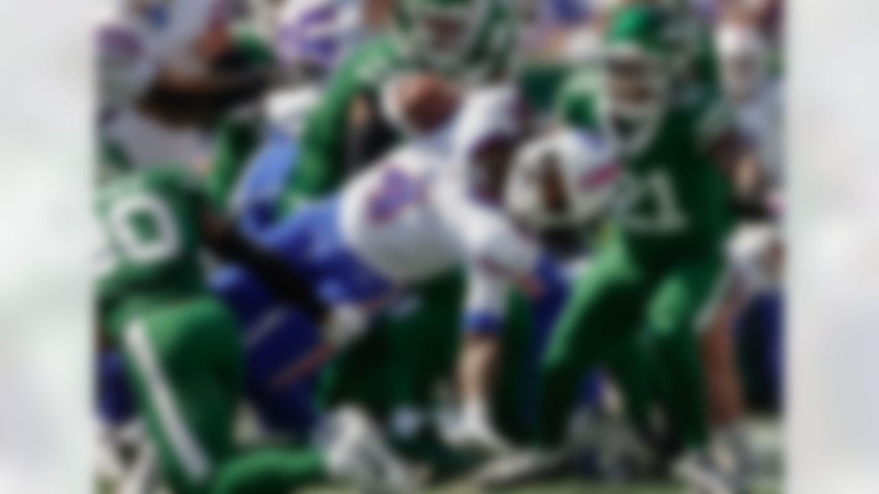 Buffalo Bills running back James Cook (4) crosses the goal line to score a touchdown against the New York Jets during the first quarter of an NFL football game, Sunday, Sept. 14, 2025, in East Rutherford, New Jersey.