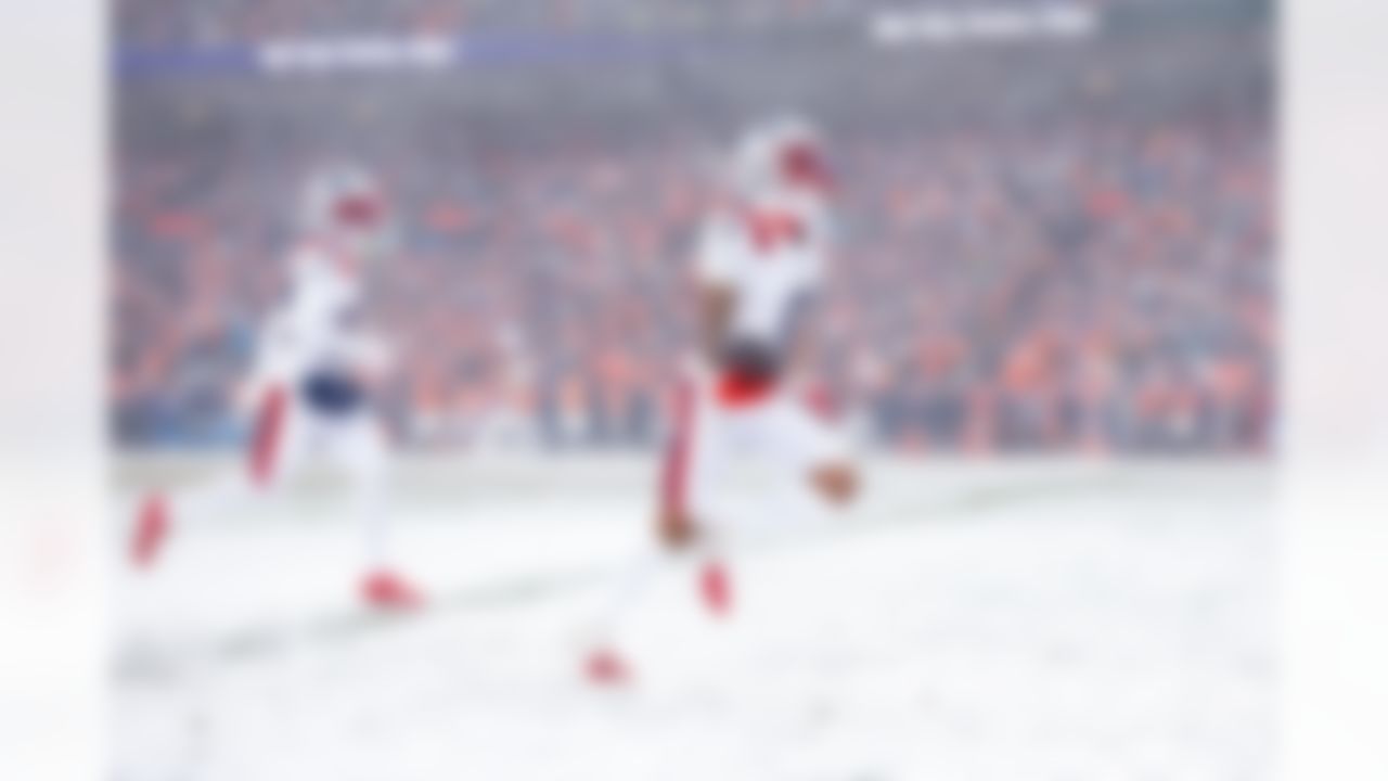 New England Patriots cornerback Christian Gonzalez (0) celebrates an interception during an NFL football game against the Denver Broncos on Sunday, January 25, 2026 in Denver, Colorado.