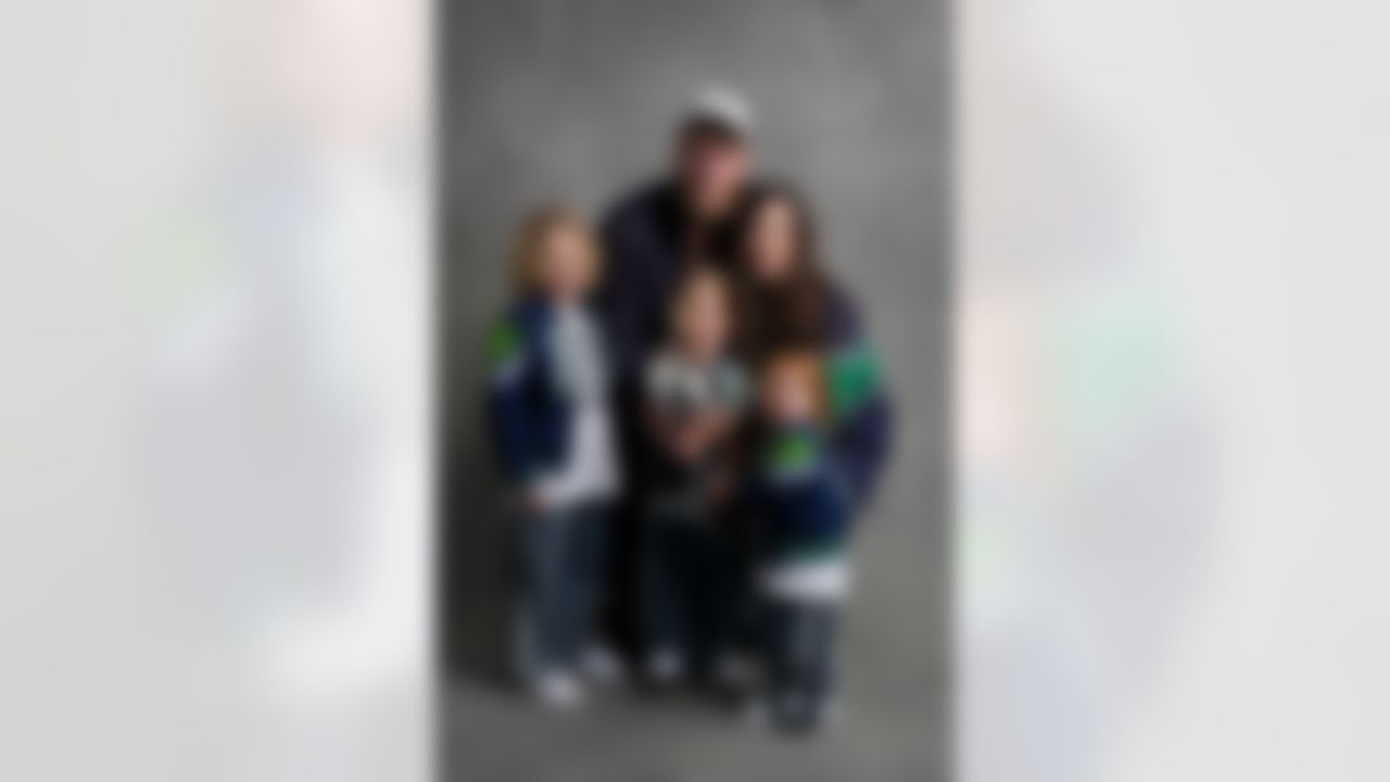 Seattle Seahawks wide receiver Cooper Kupp (10) poses with his family for a portrait with the Vince Lombardi Trophy after the NFL Super Bowl LX football game against the New England Patriots on Sunday, February 8, 2026 in Santa Clara, Calif.