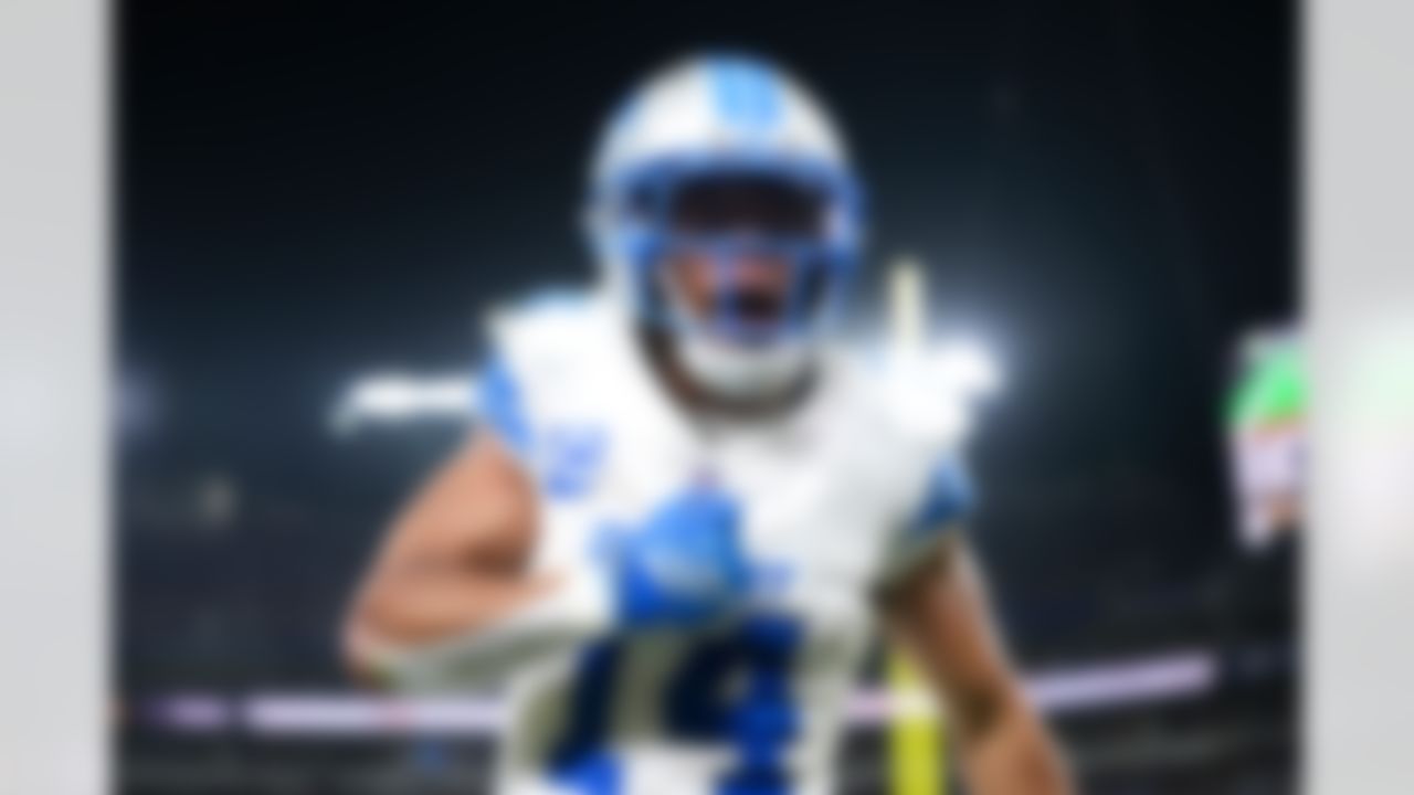 Detroit Lions wide receiver Amon-Ra St. Brown (14) celebrates a touchdown during an NFL football game against the Baltimore Ravens on Monday, Sept. 22, 2025 in Baltimore.