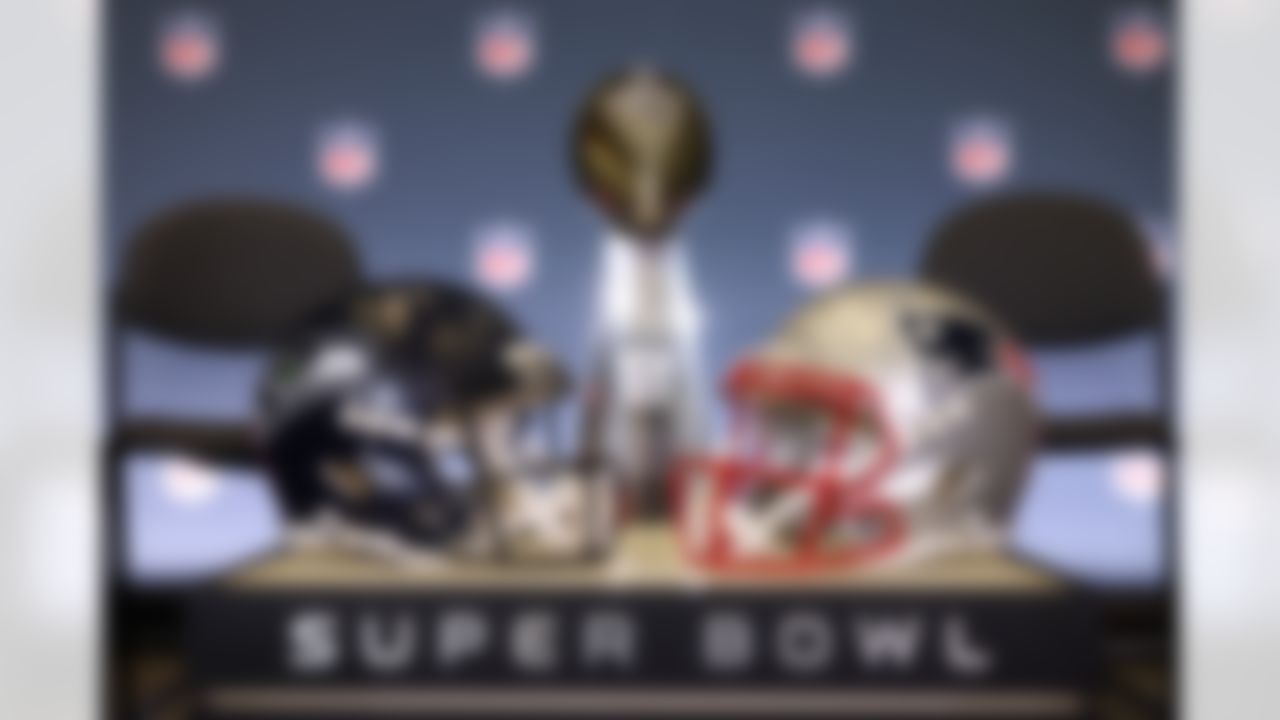 Seattle Seahawks and New England Patriots helmets are seen next to the Lombardi Trophy prior to NFL Commissioner Roger Goodell's news conference ahead of the Super Bowl 60 football game on Monday, February 2, 2026 in San Jose, Calif.