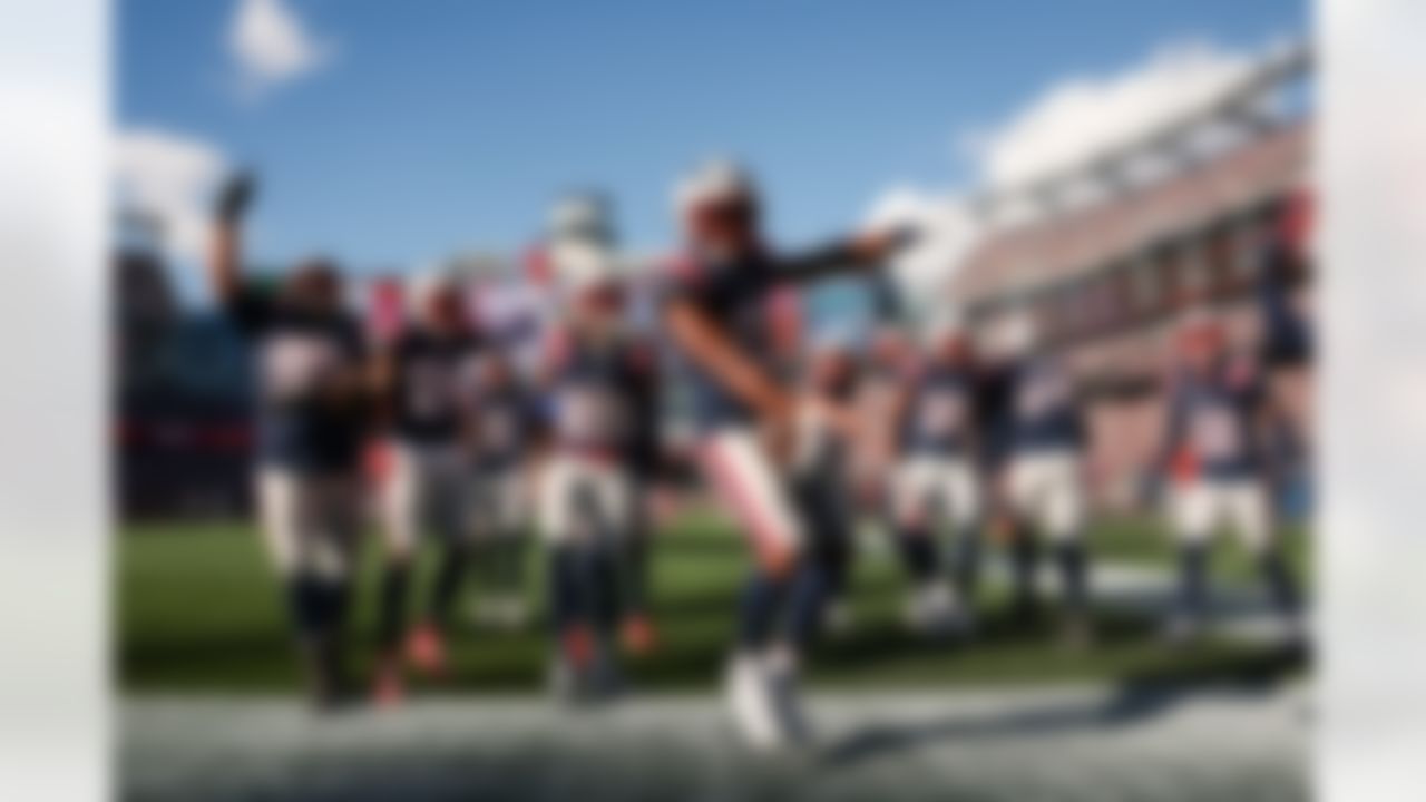 New England Patriots safety Jaylinn Hawkins (21) and the defense celebrate after an interception during an NFL football game against the Cleveland Browns on Sunday, October 26, 2025 in Foxborough, Massachusetts.