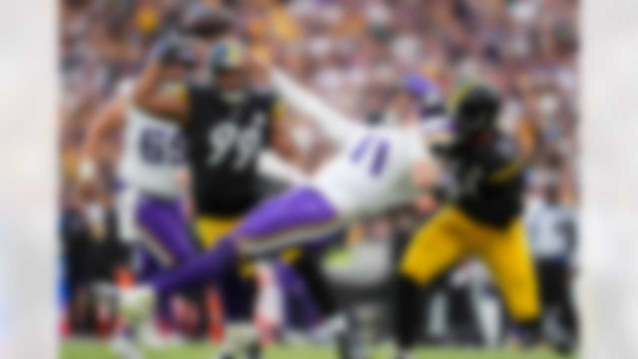 Pittsburgh Steelers linebacker Nick Herbig (51) pressures Minnesota Vikings quarterback Carson Wentz (11) during an NFL football game on Sunday, September 28, 2025 in Dublin, Ireland.