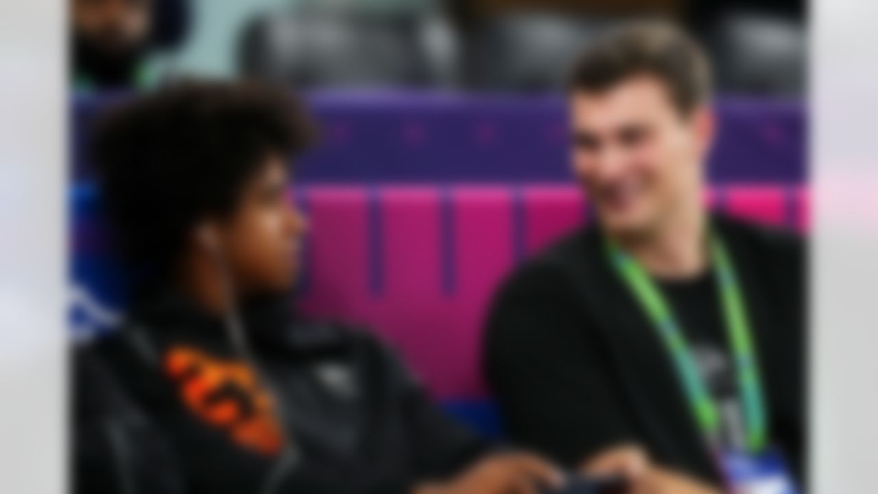 Southern California wide receiver Ja'Kobi Lane (27) and Indiana quarterback Fernando Mendoza (11) chat during the 2026 NFL Scouting Combine on Saturday, February 28, 2026 in Indianapolis, Indiana.