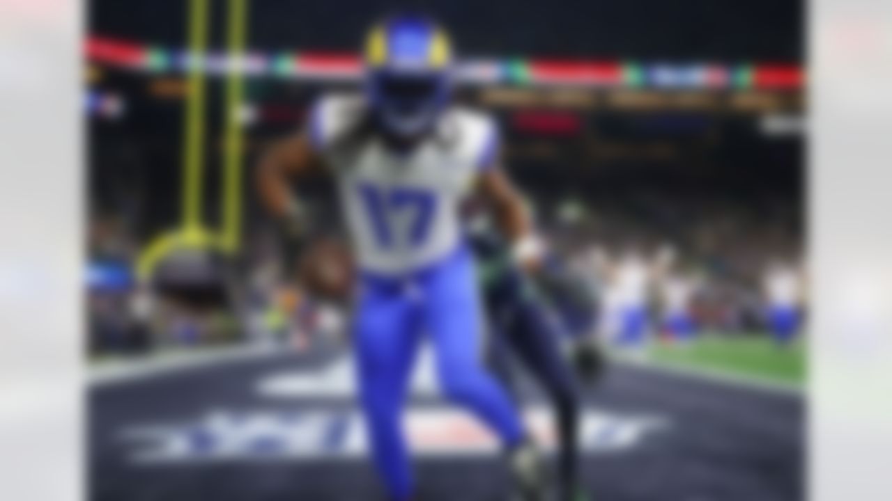 Los Angeles Rams wide receiver Davante Adams (17) celebrates after scoring a touchdown during an NFL football game against the Seattle Seahawks on Sunday, January 25, 2026 in Seattle, Washington.