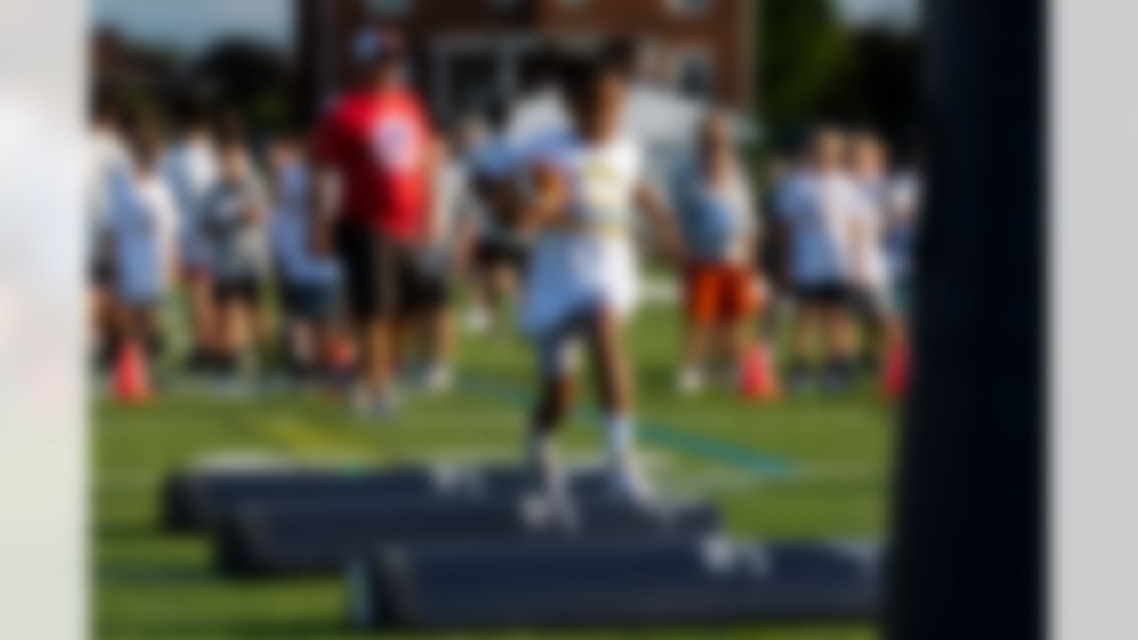Kids run drills during the Play Football Skills Camp on Tuesday, July 29, 2025 in Canton.