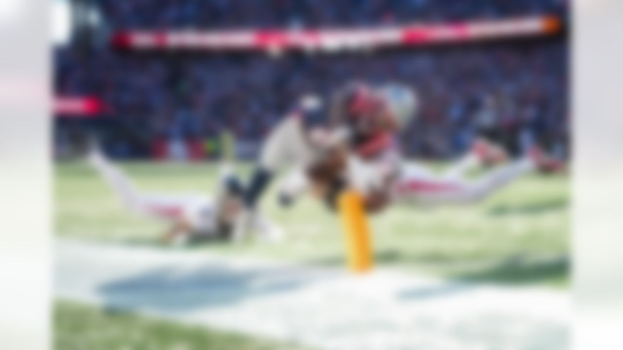 New England Patriots wide receiver Stefon Diggs (8) scores a touchdown during an NFL football game against the Atlanta Falcons on Sunday, Nov. 2, 2025 in Foxborough, Massachusetts.