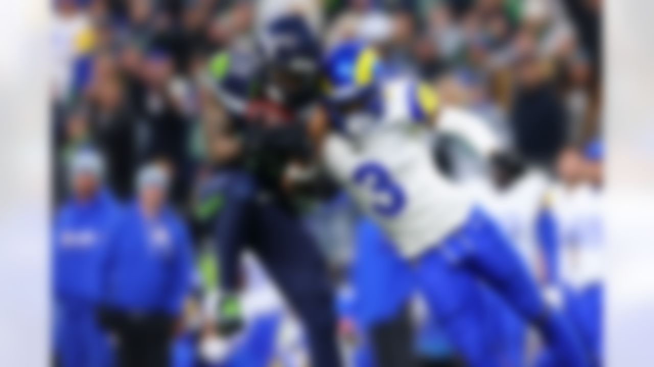 Seattle Seahawks wide receiver Jaxon Smith-Njigba (11) makes a catch during an NFL football game against the Los Angeles Rams on Sunday, January 25, 2026 in Seattle, Washington.