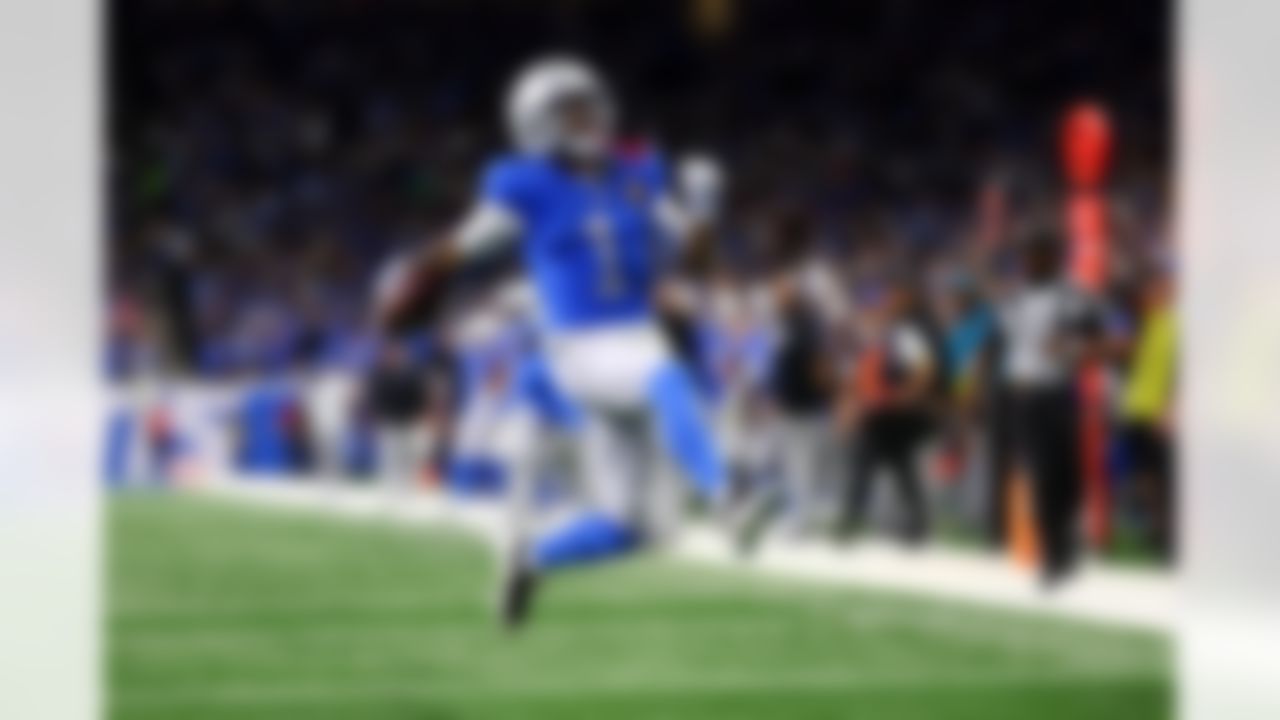 Detroit Lions wide receiver Jameson Williams (1) scores a touchdown during an NFL football game against the Green Bay Packers on Thursday, November 27, 2025 in Detroit, Michigan.