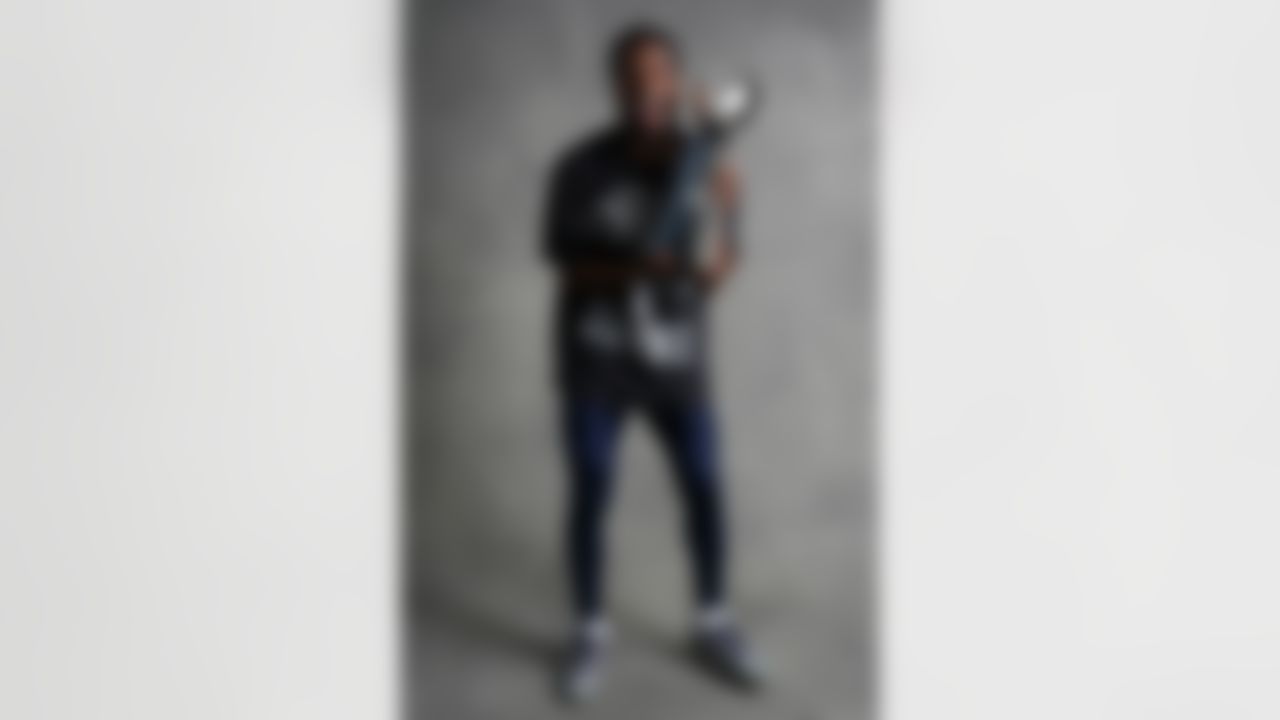 Seattle Seahawks cornerback Devon Witherspoon (21) poses for a portrait with the Vince Lombardi Trophy after the NFL Super Bowl LX football game against the New England Patriots on Sunday, February 8, 2026 in Santa Clara, Calif.