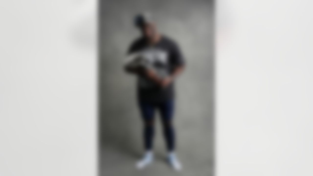 Seattle Seahawks linebacker Derick Hall (58) poses for a portrait with the Vince Lombardi Trophy after the NFL Super Bowl LX football game against the New England Patriots on Sunday, February 8, 2026 in Santa Clara, Calif.