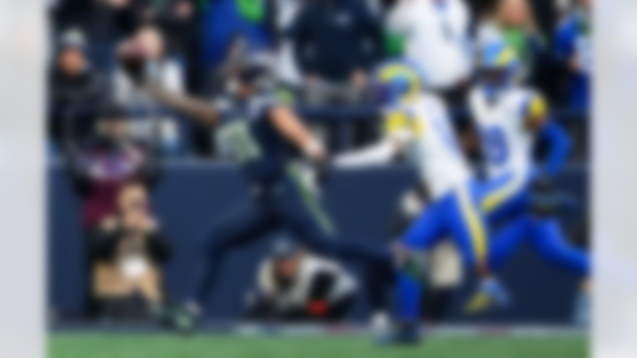 Seattle Seahawks wide receiver Jaxon Smith-Njigba (11) makes a catch past Los Angeles Rams cornerback Cobie Durant (14) during the first half of the NFC Championship NFL football game Sunday, Jan. 25, 2026, in Seattle.