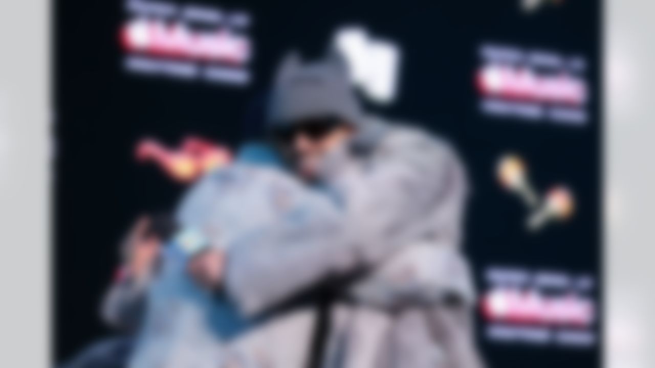 Bad Bunny walks to the stage at the Apple Music Halftime Show press conference ahead of the Super Bowl 60 football game on Thursday, February 5, 2026 in San Francisco.