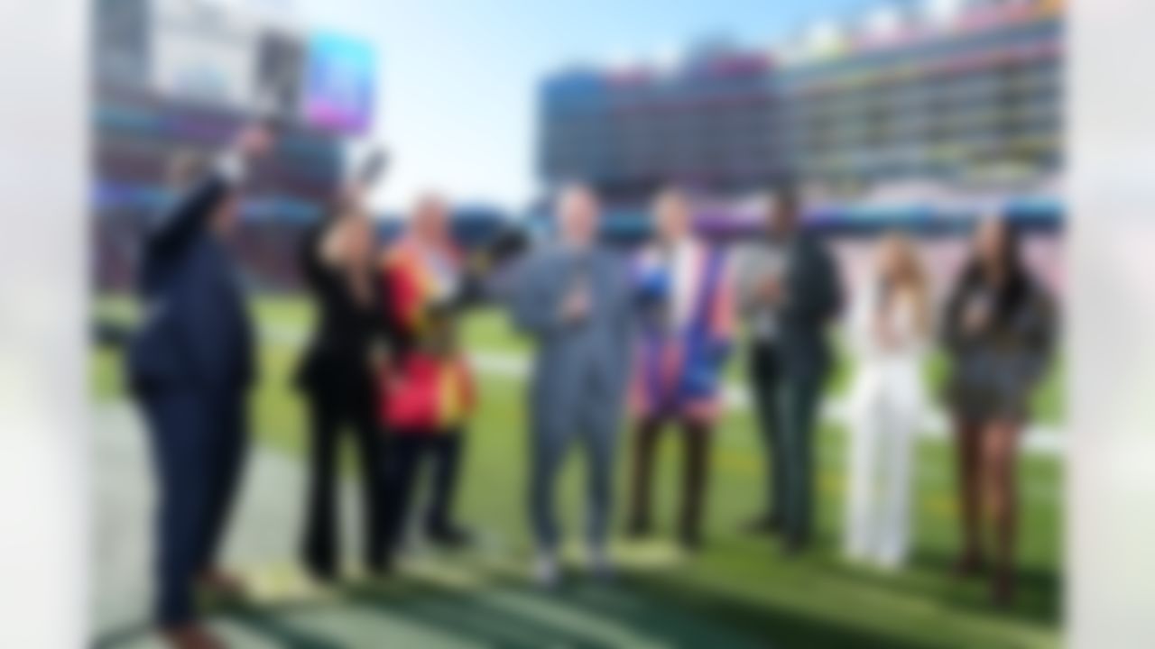 NFL Network host Kyle Brandt, host Colleen Wolfe, analyst Steve Mariucci, host Rich Eisen, analyst Kurt Warner, analyst Gerald McCoy, analytics expert Cynthia Frelund and host Kimmi Chex stand on set prior to the NFL Super Bowl LX football game between the New England Patriots and Seattle Seahawks on Sunday, February 8, 2026 in Santa Clara, Calif.