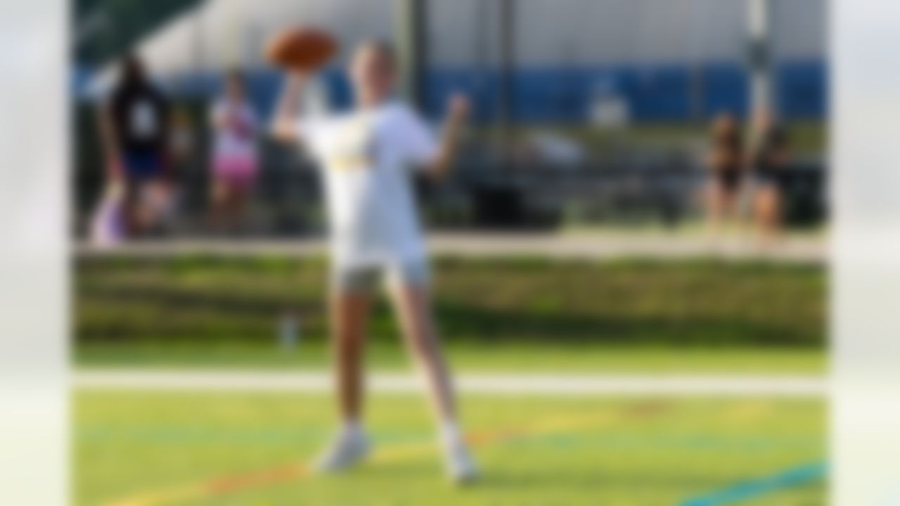 Kids run drills during the Play Football Skills Camp on Tuesday, July 29, 2025 in Canton.