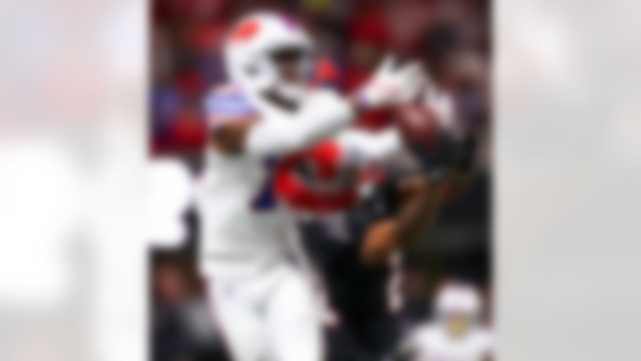 Atlanta Falcons cornerback Mike Hughes (21) disrupts a pass meant for Buffalo Bills wide receiver Tyrell Shavers (14) during an NFL football game on Monday, Oct. 13, 2025 in Atlanta.