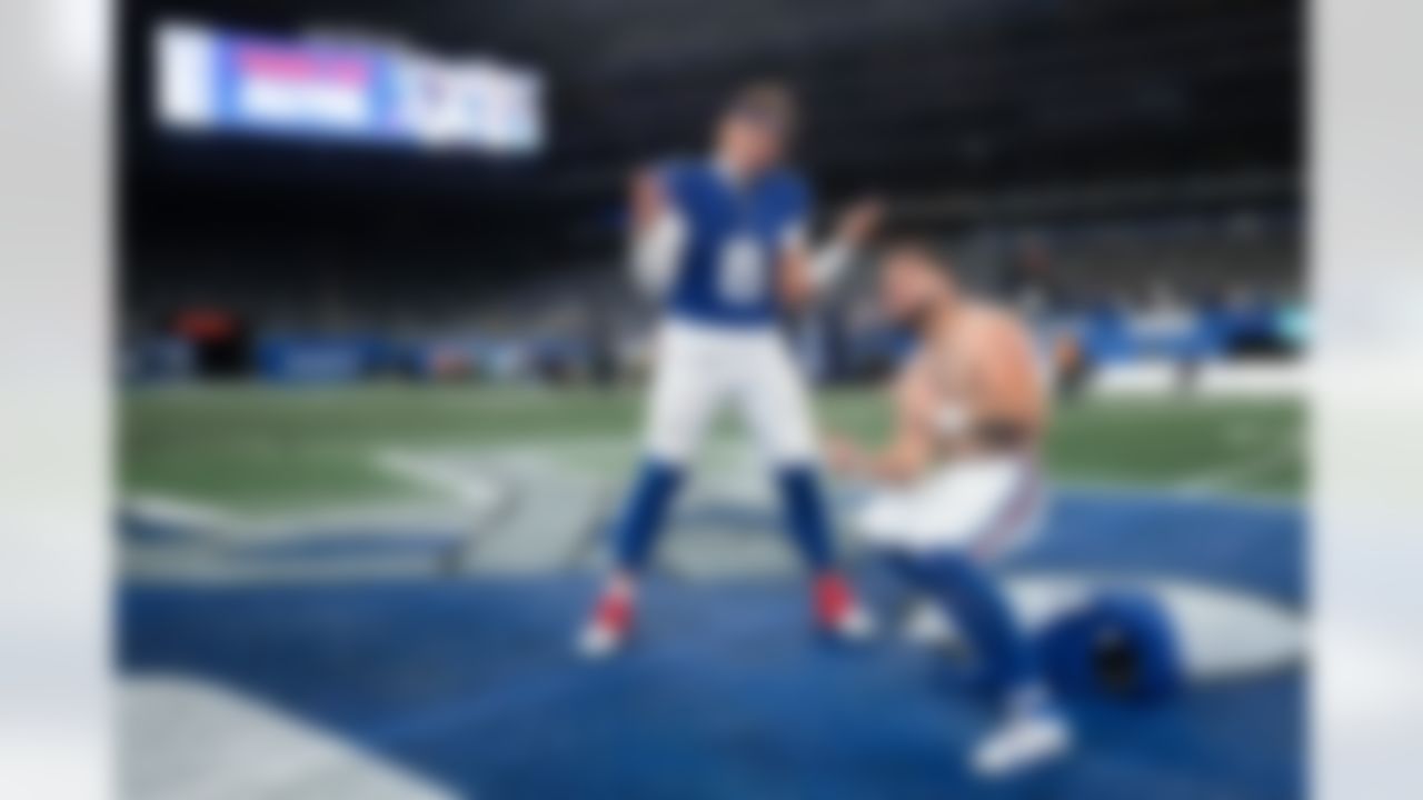 New York Giants quarterback Jaxson Dart (6) and running back Cam Skattebo (44) celebrate after an NFL football game against the Philadelphia Eagles on Thursday, Oct. 9, 2025 in East Rutherford, New Jersey.