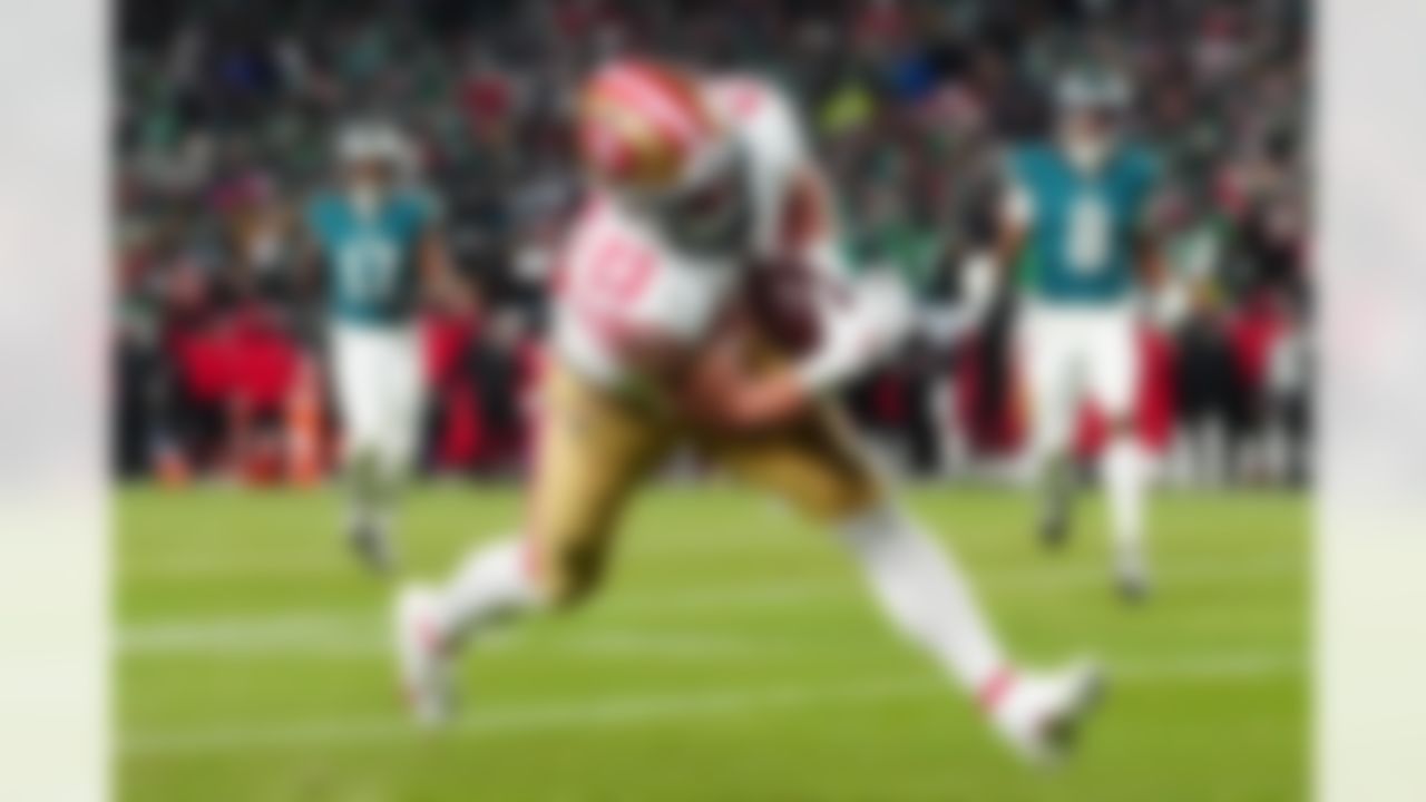 San Francisco 49ers running back Christian McCaffrey scores a touchdown during the second half of an NFL wild-card playoff football game against the Philadelphia Eagles on Sunday, Jan. 11, 2026, in Philadelphia.
