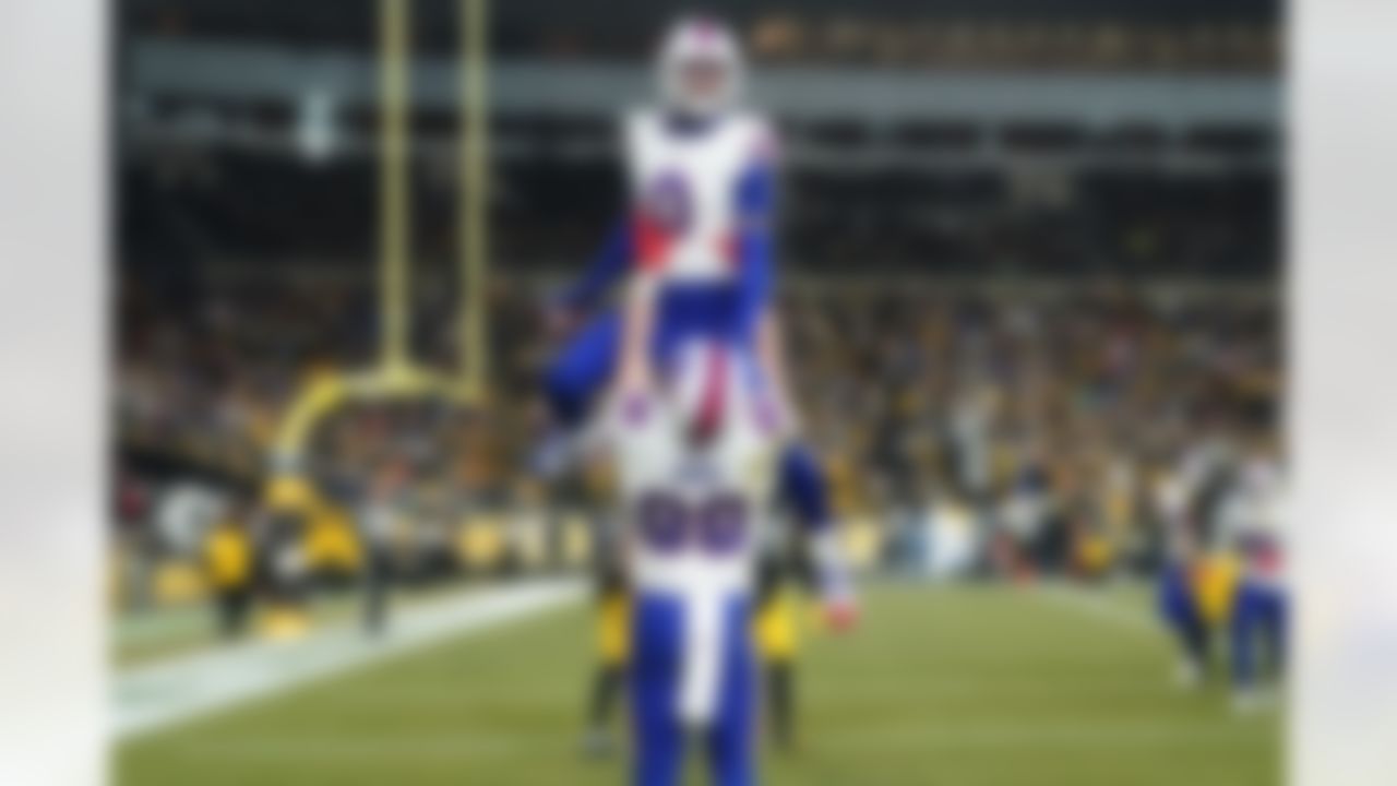 Buffalo Bills wide receiver Keon Coleman (0) celebrates with tight end Dawson Knox (88) after a touchdown during the second half of an NFL football game against the Pittsburgh Steelers Sunday, Nov. 30, 2025, in Pittsburgh.