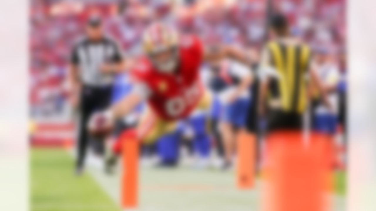San Francisco 49ers tight end George Kittle (85) scores a touchdown during an NFL football game against the Los Angeles Rams on Sunday, Nov. 9, 2025 in Santa Clara, California.