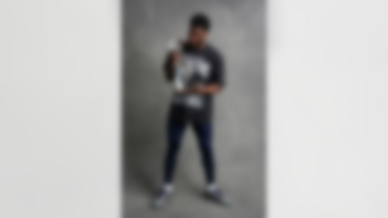 Seattle Seahawks cornerback Devon Witherspoon (21) poses for a portrait with the Vince Lombardi Trophy after the NFL Super Bowl LX football game against the New England Patriots on Sunday, February 8, 2026 in Santa Clara, Calif.