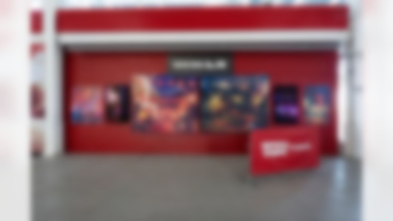 Style guide images used as decor on a wall within Levi's Stadium.