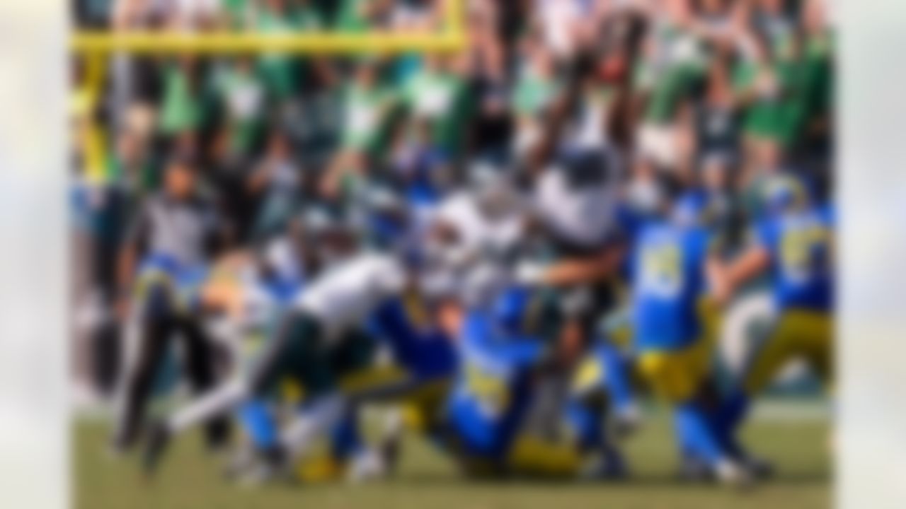 Philadelphia Eagles defensive tackle Jordan Davis (90) leaps to block a field goal attempt by Los Angeles Rams kicker Joshua Karty (16) during an NFL football game, Sunday, Sep. 21, 2025, in Philadelphia.