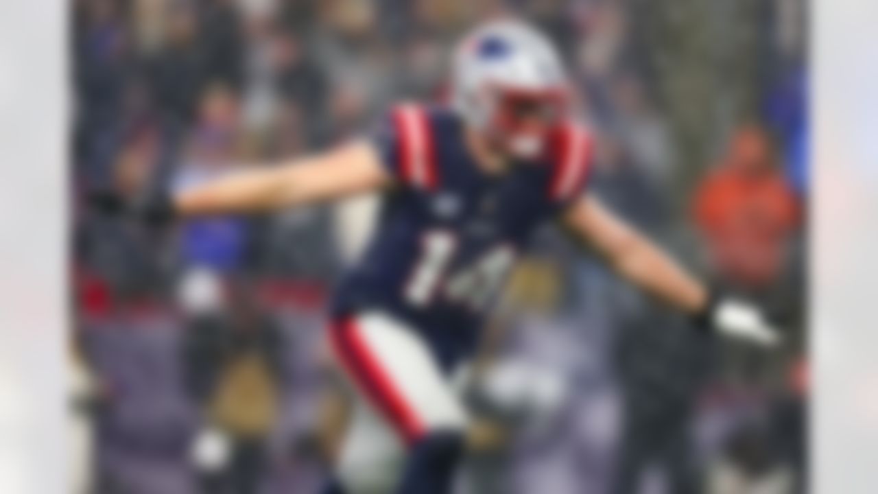 New England Patriots linebacker Robert Spillane (14) celebrates after breaking up a pass during an NFL football game against the Houston Texans on Sunday, January 18, 2026 in Foxborough, Massachusetts.