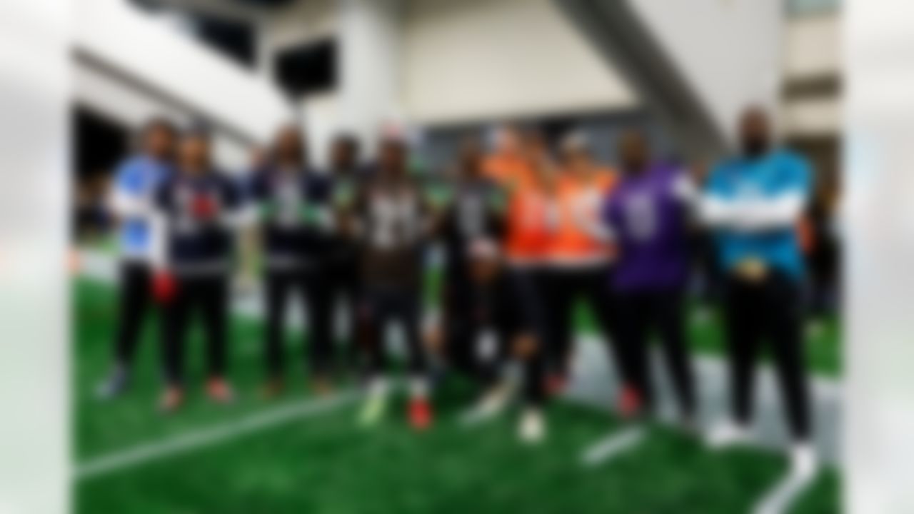 Houston Texans cornerback Derek Stingley Jr. (24), safety Calen Bullock (2) and cornerback Kamari Lassiter (4), Cleveland Browns cornerback Denzel Ward (21), Houston Texans linebacker Azeez Al-Shaair (0), Denver Broncos defensive end Zach Allen (99), cornerback Pat Surtain II (2) and linebacker Nik Bonitto (15) and Baltimore Ravens inside linebacker Roquan Smith (0) pose for a photo prior to the 2026 Pro Bowl Game on Tuesday, February 3, 2026 in San Francisco, California.