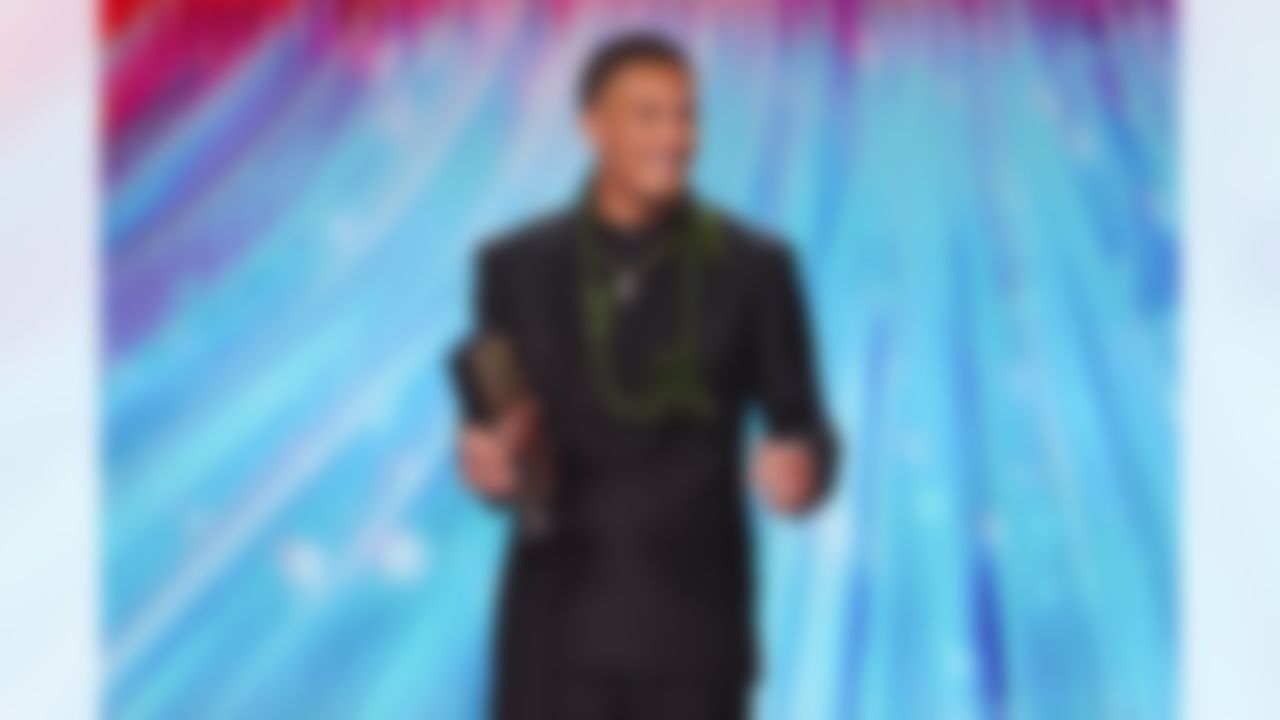 Carolina Panthers wide receiver Tetairoa McMillan (4) accepts his award for AP rookie of the year during the NFL Honors awards show on Thursday, February 5, 2026 in San Francisco, California.