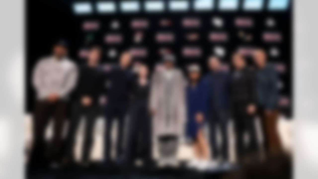 Halftime performer Bad Bunny poses with Apple MusicÕs Ebro Darden and Zane Lowe, along with Roc Nation members, at the Apple Music Halftime Show press conference ahead of the Super Bowl 60 football game on Thursday, February 5, 2026 in San Francisco.