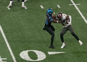 Rachaad White's wicked stiff-arm sends a Lions defender to the turf