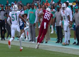 Murray's 17-yard loft on the run hits toe-tapping McBride in Dolphins territory