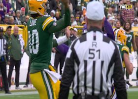 Jordan Love's fadeaway throw is complete to the leaping Dontayvion Wicks for 14-yard gain