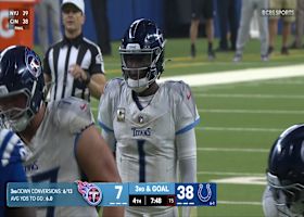 Neville Gallimore corrals Cam Ward with sack at sideline