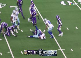 Javonte Williams is tossed to the ground on 21-yard dash