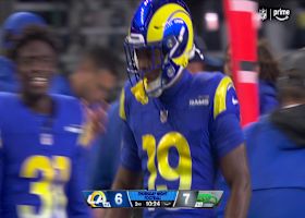 Xavier Smith treks to the opposite sideline on 31-yard punt return